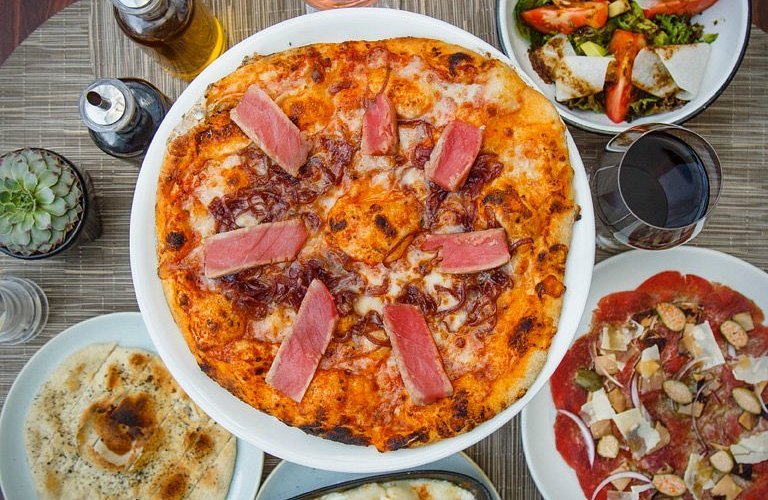 Opinión de Romina Pizza: Sabor y calidad en cada bocado